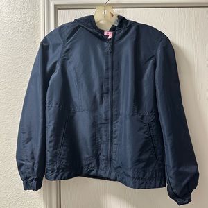 Like new girl’s lined windbreaker with hood.